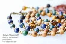 Load image into Gallery viewer, Beads for Our Lady of Woodstock 2021 consists of Lava, Chrysocolla, Olive Wood, Tiger Eye, Wood Grain Jasper and MORE!