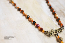 Load image into Gallery viewer, Our Lady of Woodstock is a lightweight rosary made up mainly of 6mm beads!