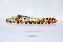 Load image into Gallery viewer, 6mm Fair Trade Wood Beads with gold spacers