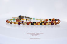 Load image into Gallery viewer, 6mm Fair Trade Wood Beads with gold spacers
